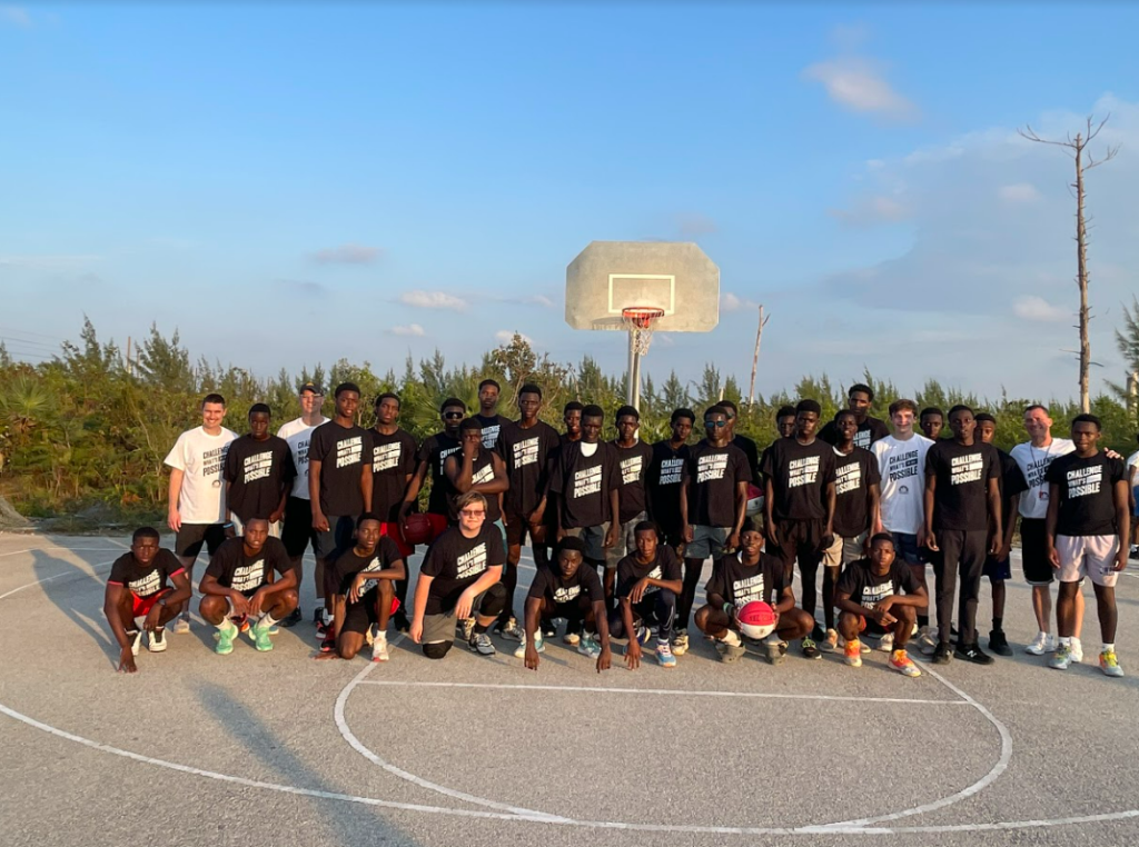 The boys baskeball camp participants and the three coaches